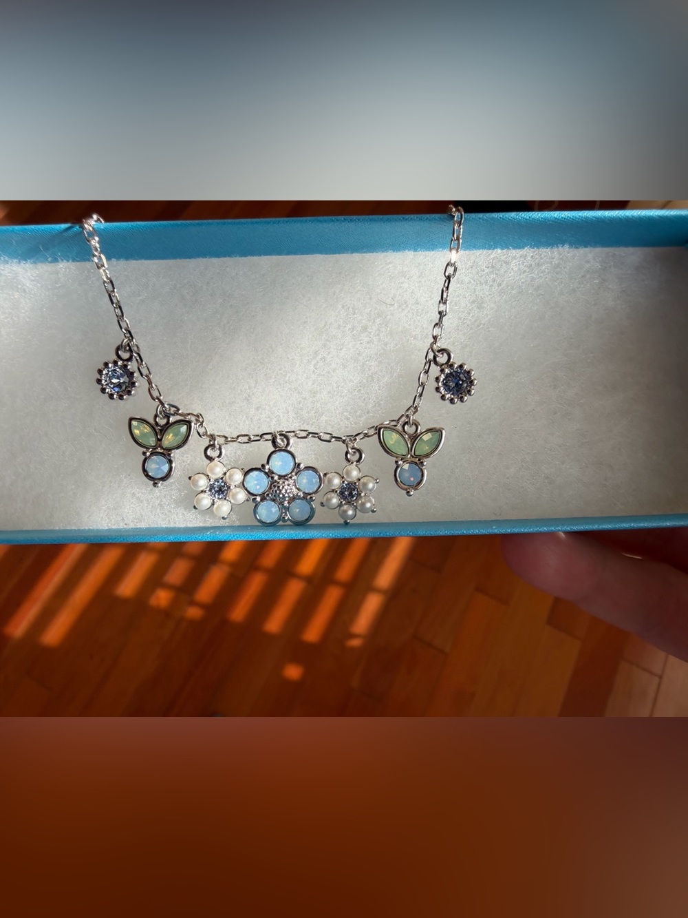 Touchstone Crystal by Swarovski. Spring Blossom Blue and Green Pendant Necklace